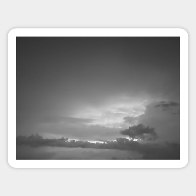 Grey white cloudscape with dark distinctive cloud shapes. Sticker by kall3bu